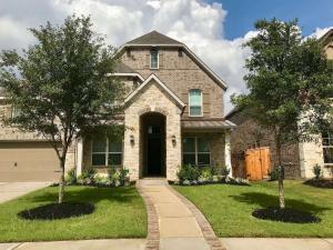 front yard landscape stone edging houston tx 77407