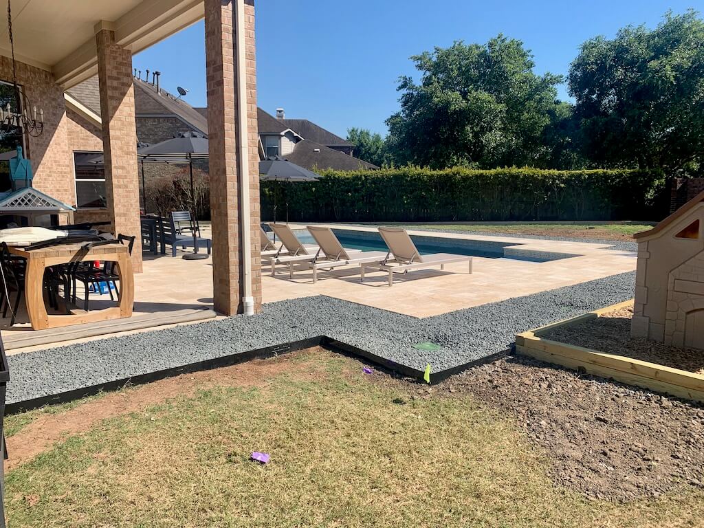 Brown Concrete Paver Walkway With Curshed Granite