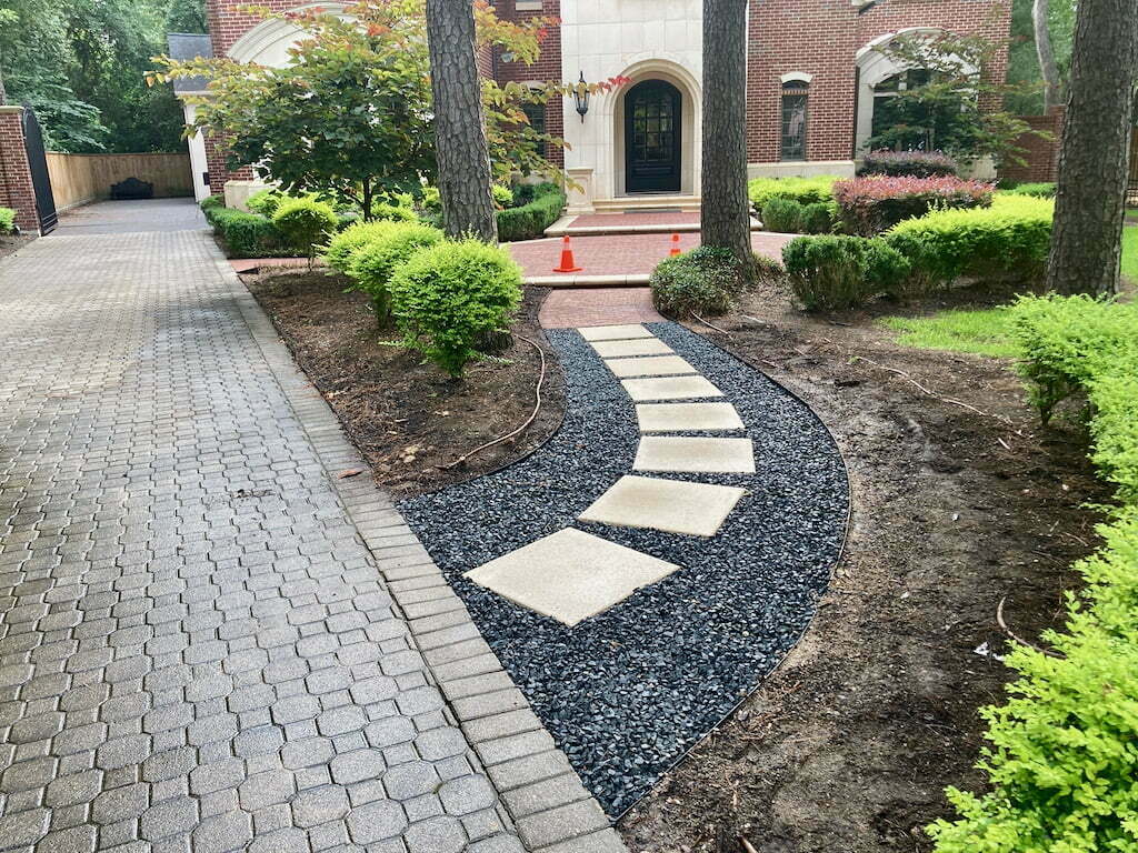 Brown Concrete Paver Walkway With Curshed Granite