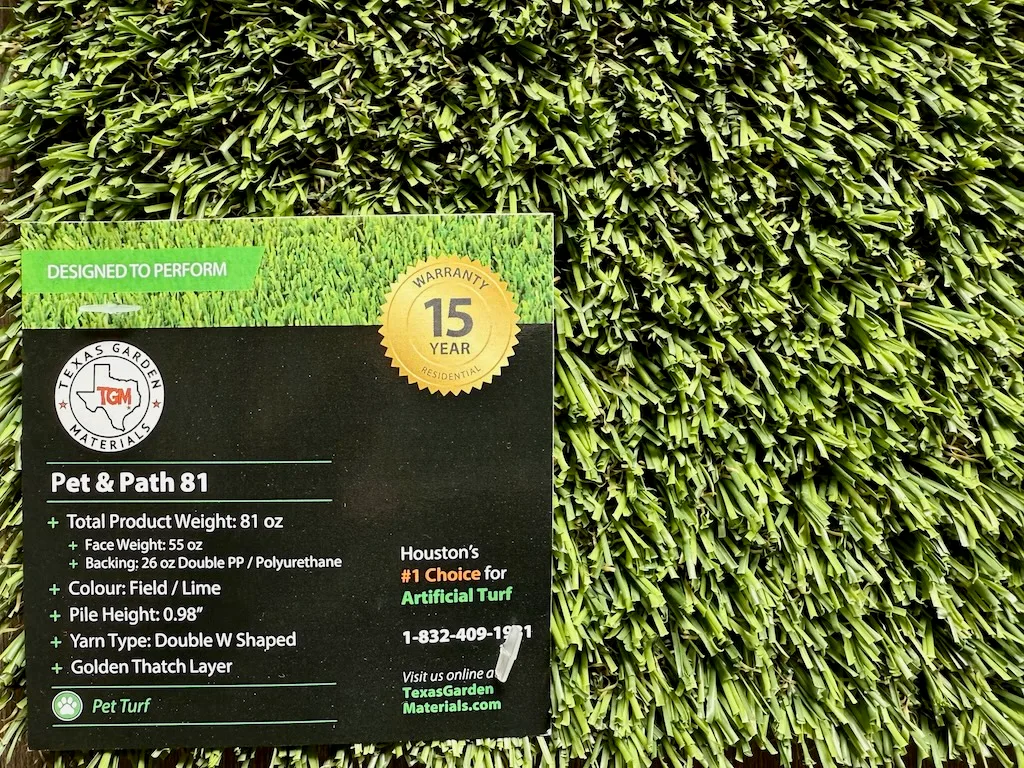 Professional artificial turf installation for dogs in Houston – crew preparing and laying Pet & Paver 81 synthetic grass with clean, level finish